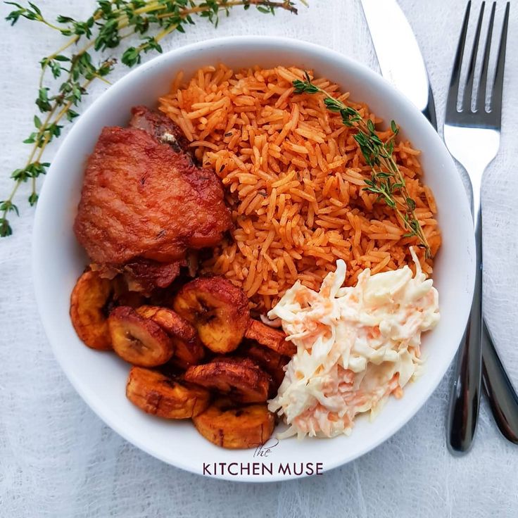 Jollof Rice, salad, plantain, and Turkey